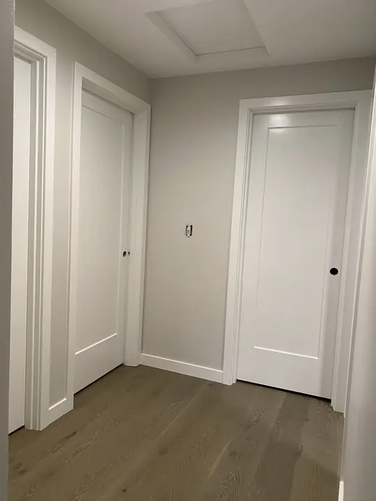 Oak floor and new trim in a bright hallway