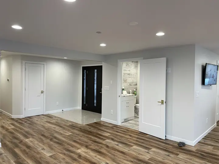 Living area with continuous wood-look plank floor