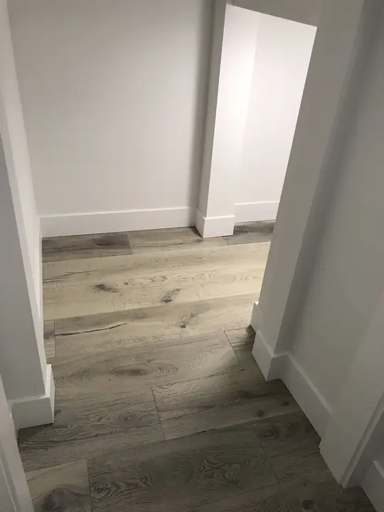 Light oak flooring in a hallway