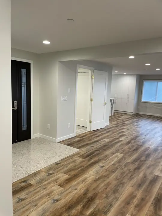 Wide-plank flooring through an open living space
