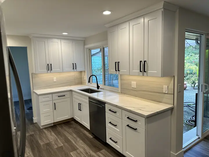 Bright white shaker kitchen with quartz counters