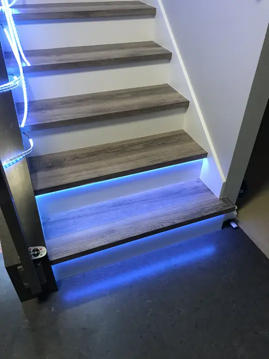 Staircase with LED-lit treads